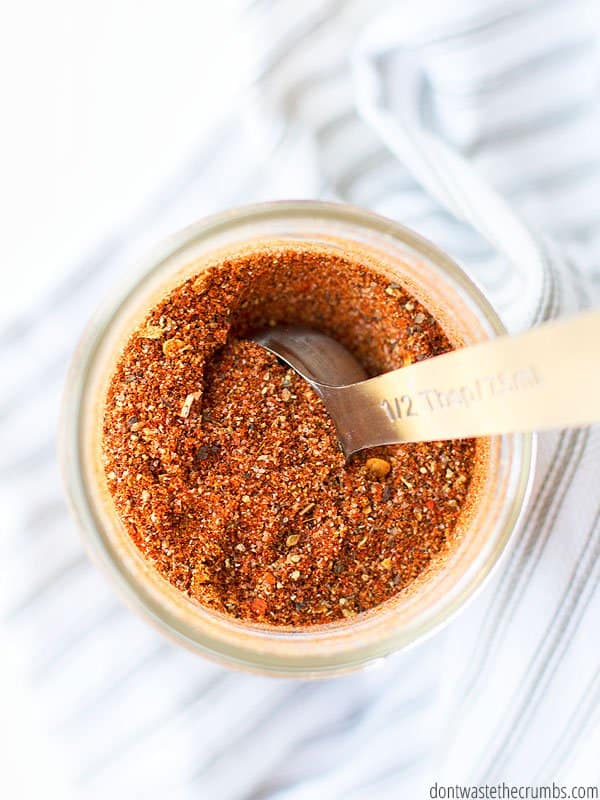 taco seasoning in jar with spoon